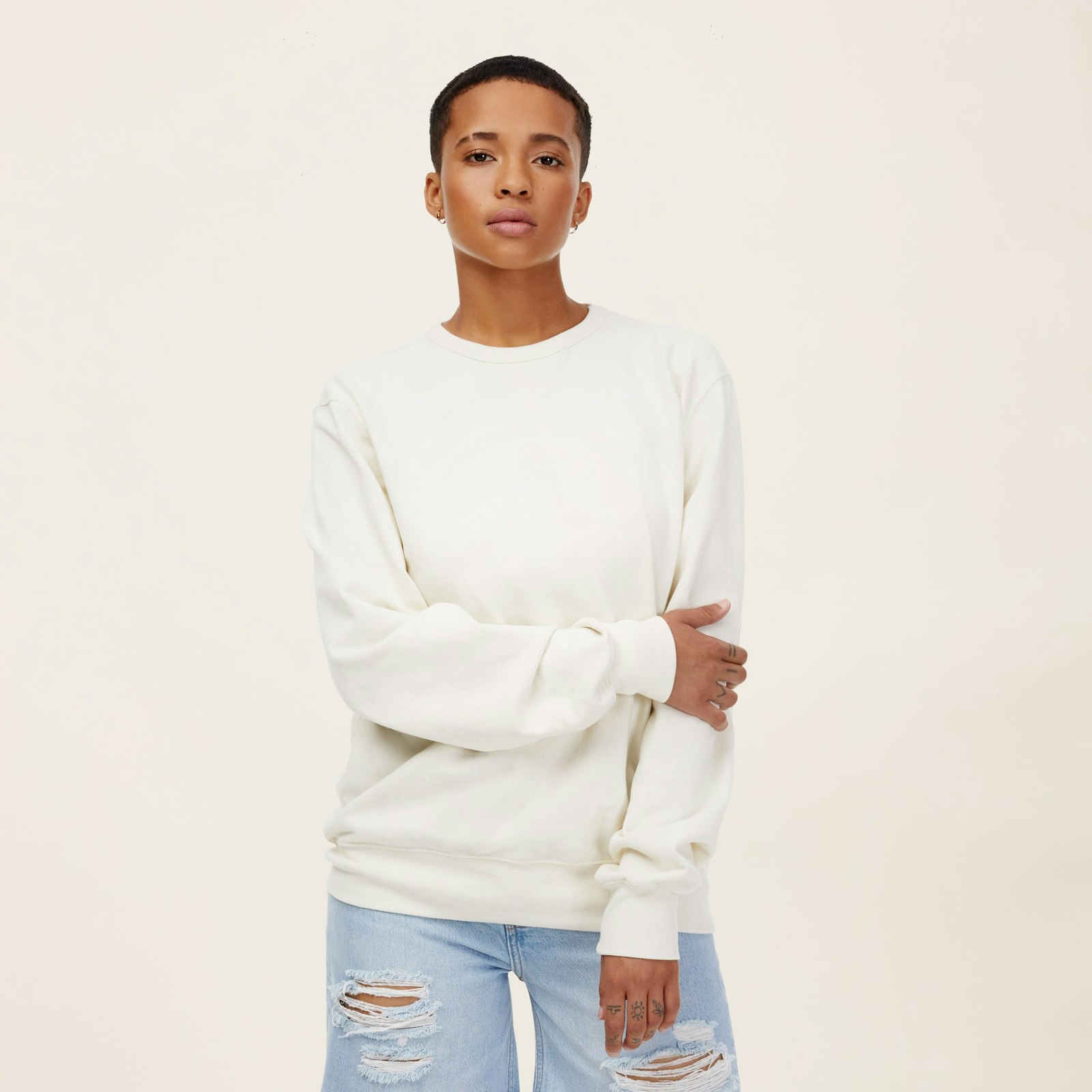 UnisexRecycledTerryPulloverCrew_OffWhite_Womens_OnFigure_1x1_1135.jpg