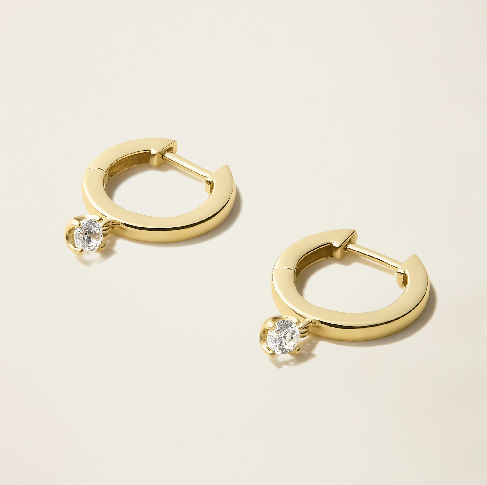14k Solid Gold Diamond Drop Huggie Earrings_A_0259.jpeg
